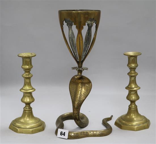 A Benares brass snake vase and a pair of Victorian brass candlesticks